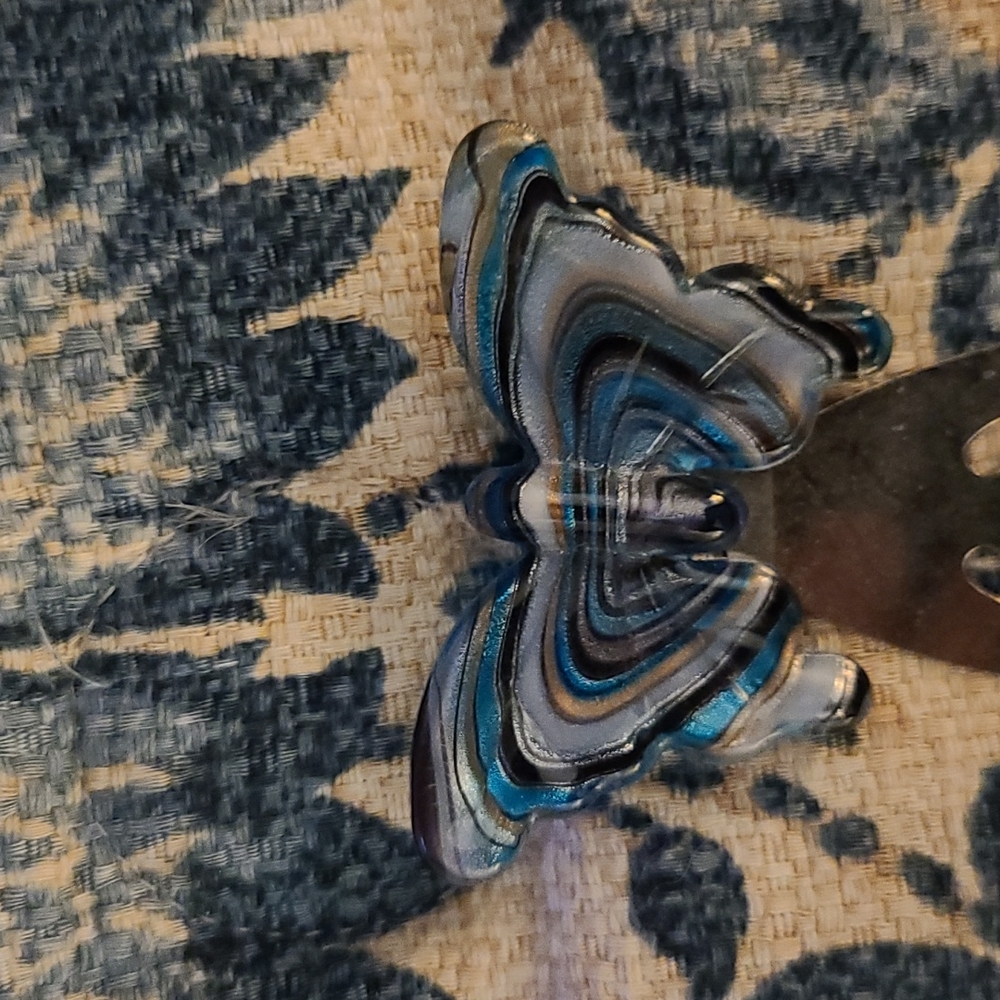 Butterfly glass page holder